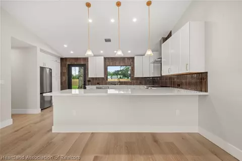 Kitchen - 905 E Dinner Lake Dr, Sebring, FL 33870 photo 1 of 6