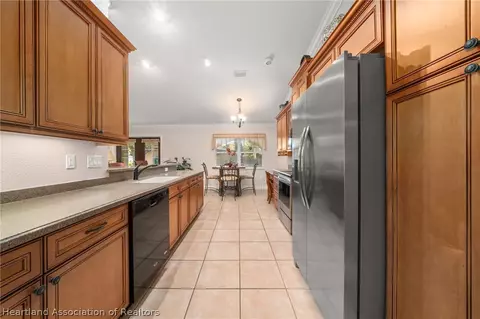 Kitchen - 3904 Golfview Rd, Sebring, FL 33875 photo 3 of 6