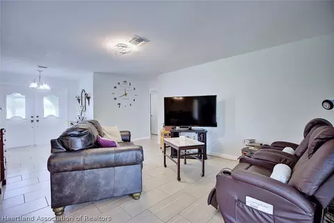 Living - 906 Corvette Ave, Sebring, FL 33872 photo 1 of 2