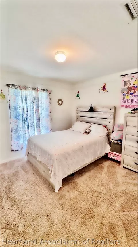 Bedroom - 4879 San Ignacio Dr, Sebring, FL 33872 photo 5 of 8
