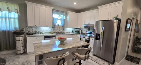 Kitchen - 607 Porsche Ave, Sebring, FL 33872 photo 2 of 3