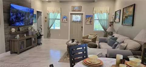 Living - 607 Porsche Ave, Sebring, FL 33872 photo 1 of 1