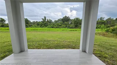 Exterior - 7335 Ancha St, Sebring, FL 33872 photo 6 of 10