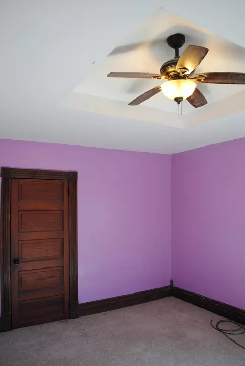 Bedroom - 312 E 2nd St, Leaf River, IL 61047 photo 3 of 8