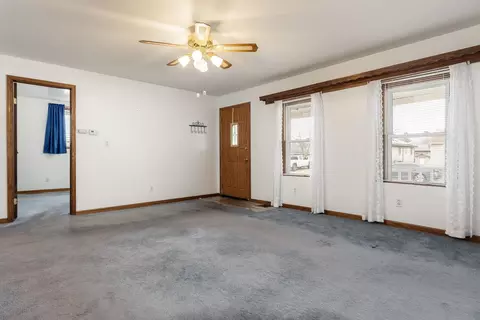 Living - 719 E 4th St, Belvidere, IL 61008 photo 4 of 6