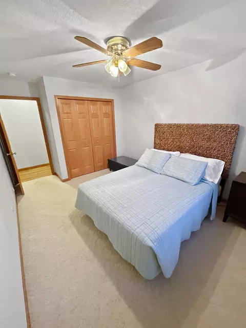 Bedroom - 27-54 Ridgeview Dr, Lanark, IL 61046 photo 4 of 6