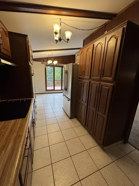 Kitchen - 7705 E Rockton Rd, Roscoe, IL 61073 photo 2 of 3