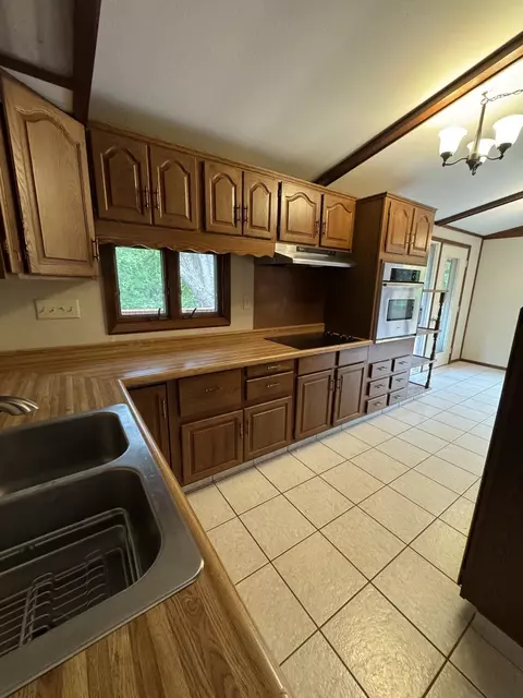 Kitchen - 7705 E Rockton Rd, Roscoe, IL 61073 photo 1 of 3