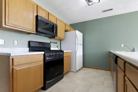 Kitchen - 10050 Skipperling Rd, Roscoe, IL 61073 photo 2 of 3