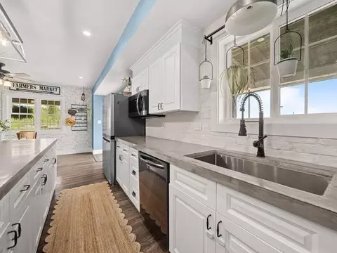 Kitchen - 8294 N Leaf River Rd, Leaf River, IL 61047 photo 5 of 6