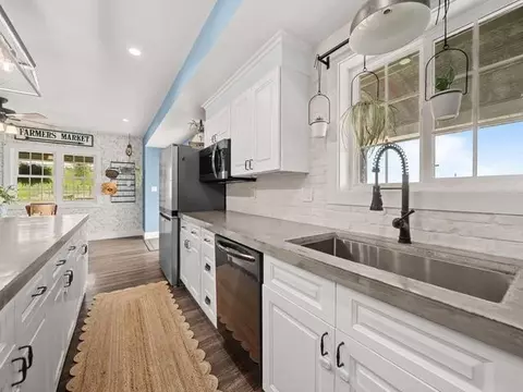 Kitchen - 8294 N Leaf River Rd, Leaf River, IL 61047 photo 5 of 6