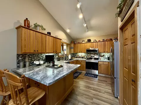Kitchen - 21 Timber Shore Dr # -9, Lanark, IL 61046 photo 3 of 4