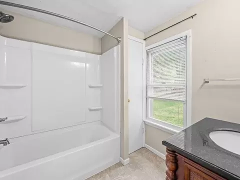 Bath - 333 E Front St, Byron, IL 61010 photo 1 of 3