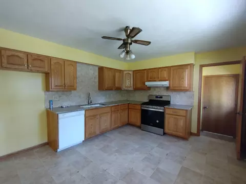 Kitchen - 312 E 11th St, Pecatonica, IL 61063 photo 2 of 3