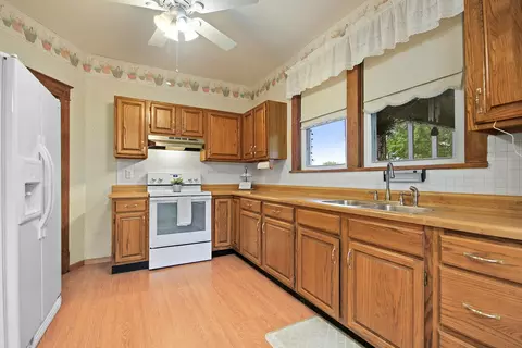Kitchen - 300 E Harrison St, Auxvasse, MO 65231 photo 2 of 3