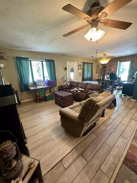 Living - 100 Burton St, Higbee, MO 65257 photo 1 of 2