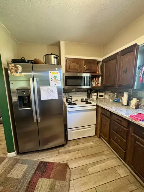 Kitchen - 100 Burton St, Higbee, MO 65257 photo 2 of 3