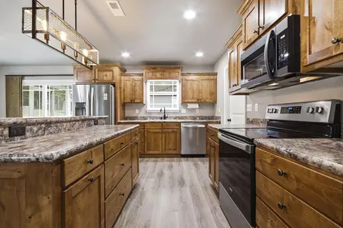 Kitchen - 307 Dover Dr, Holts Summit, MO 65043 photo 1 of 2