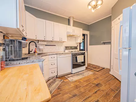 Kitchen - 420 E Logan St, Moberly, MO 65270 photo 2 of 2