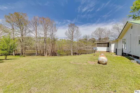 Exterior - 811 Lake Loop Rd, Downsville, LA 71234 photo 6 of 7