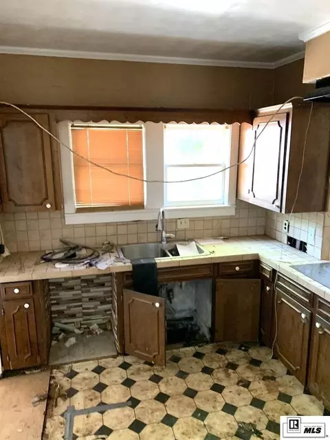 Kitchen - 1206 St John St, Monroe, LA 71202 photo 1 of 2