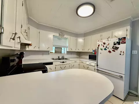 Kitchen - 414 Kelly Loop Rd, Epps, LA 71237 photo 2 of 3