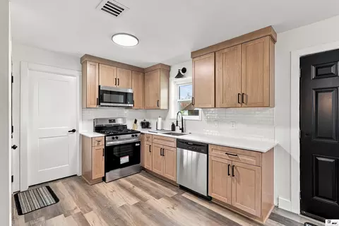 Kitchen - 209 Jones St, Epps, LA 71237 photo 2 of 4