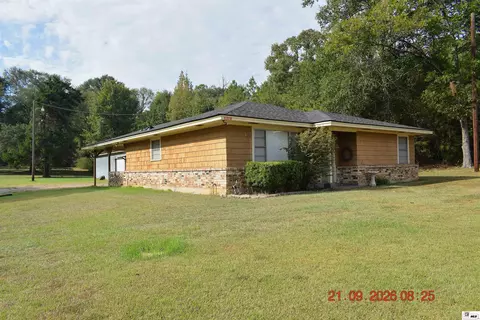 Exterior - 906 Bridge St, Bastrop, LA 71220 photo 4 of 11