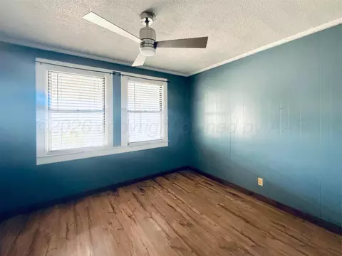 Bedroom - 611 E 3rd Street Dumas Tx 79029-4010 St, Dumas, TX 79029 photo 2 of 2