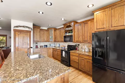 Kitchen - 233 Badger Rd, Alpine, WY 83128 photo 2 of 3