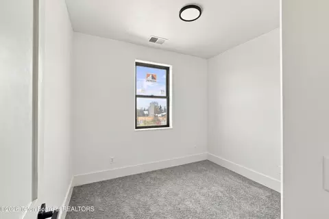 Bedroom - 287 S Agate Ave #E2, Victor, ID 83455 photo 6 of 6