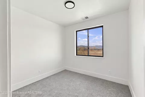Bedroom - 287 S Agate Ave #E2, Victor, ID 83455 photo 4 of 6