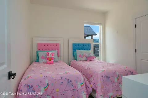 Bedroom - 311 Bald Eagle Dr, Victor, ID 83455 photo 4 of 11