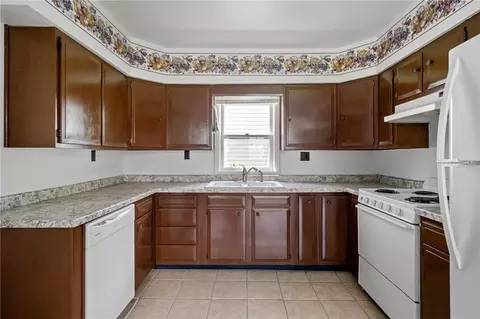 Kitchen - 115 E 3rd Ave, Stanley, WI 54768 photo 2 of 2