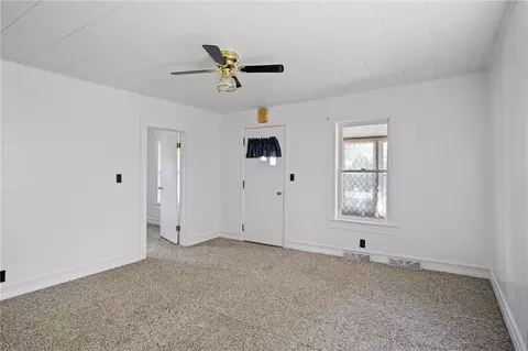 Living - 115 E 3rd Ave, Stanley, WI 54768 photo 2 of 3