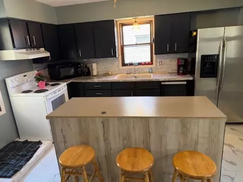 Kitchen - 117 2nd Ave, Shell Lake, WI 54871 photo 6 of 7