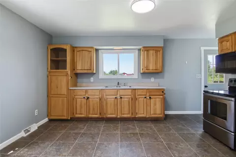 Kitchen - 802 Janicki Rd, Stanley, WI 54768 photo 2 of 2