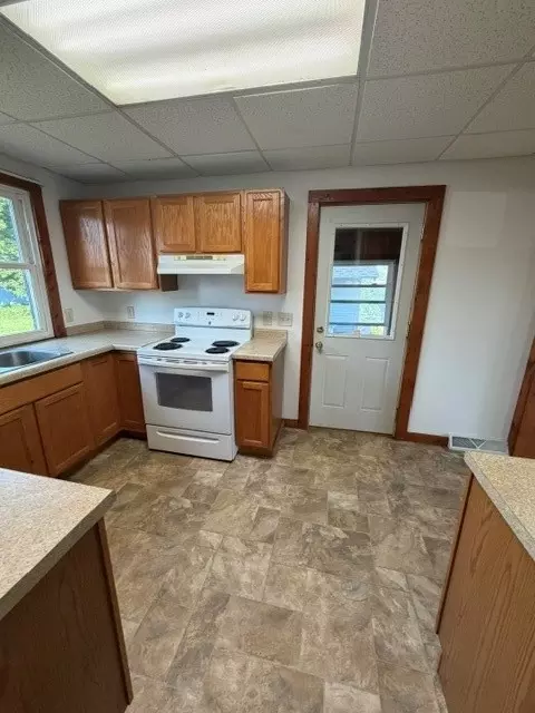 Kitchen - 121 N River St, Spooner, WI 54801 photo 1 of 2