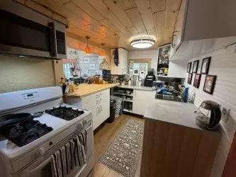 Kitchen - 415 Bashaw St UNIT S 1-4, Spooner, WI 54801 photo 2 of 3