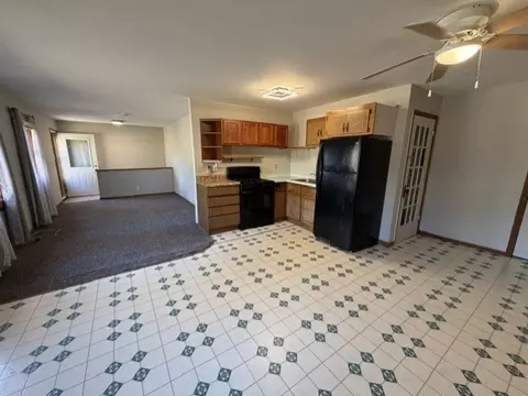 Living - 415 Bashaw St UNIT S 1-4, Spooner, WI 54801 photo 2 of 2