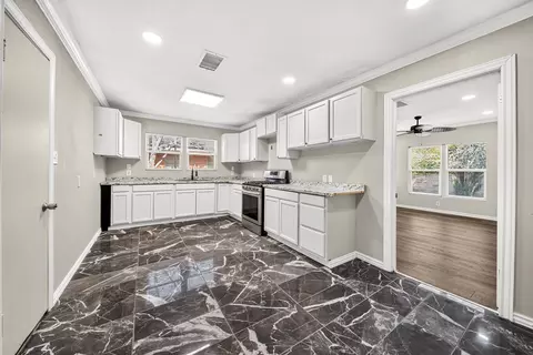 Kitchen - 1507 E 11th Pl, Big Spring, TX 79720 photo 1 of 2