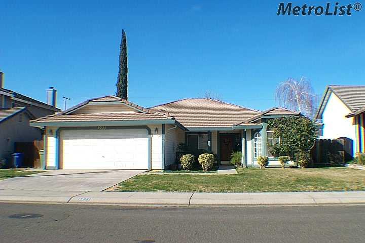 1011 Munchkin Dr, Modesto, CA 95351 photo 1