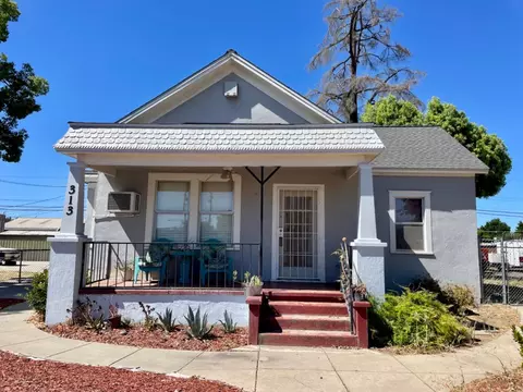Exterior - 313 E St, Waterford, CA 95386 photo 3 of 13