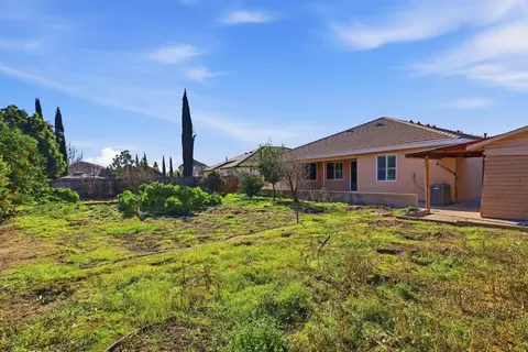 Exterior - 1730 Tasca Ln, Manteca, CA 95337 photo 9 of 14