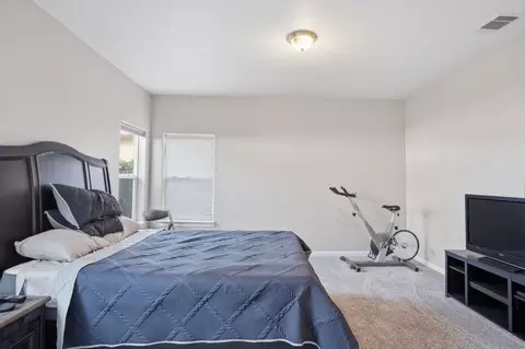 Bedroom - 215 E Hawkeye Ave, Turlock, CA 95380 photo 3 of 4