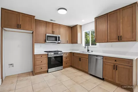 Kitchen - 1646 E 8th St, Stockton, CA 95206 photo 2 of 3