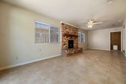 Living - 253 E Canterbury Dr, Stockton, CA 95207 photo 6 of 7