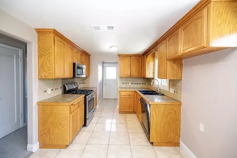 Kitchen - 825 Wheatley Ave, Modesto, CA 95351 photo 1 of 3