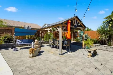 Exterior - 1322 Mossback Dr, Manteca, CA 95337 photo 7 of 12