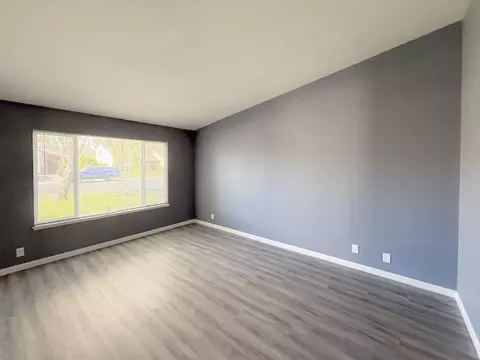Living - 1310 Wimbledon Way, Manteca, CA 95336 photo 2 of 7